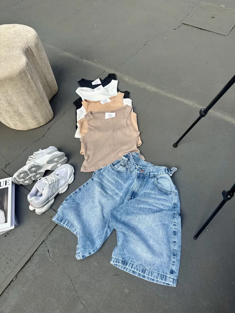 Bermuda de jeans con reguladores 